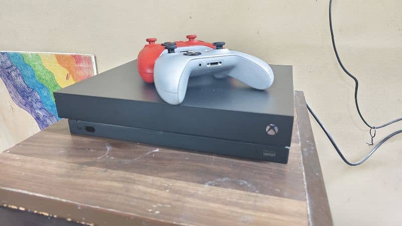 Xbox one x bundle for sale. Comes with two controllers 6