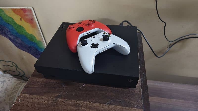Xbox one x bundle for sale. Comes with two controllers 7