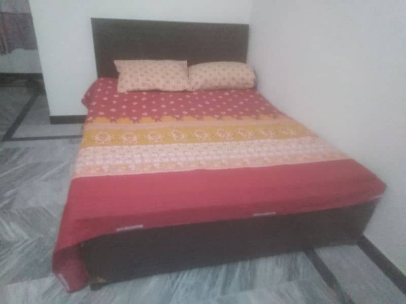 Double bed with foam mattress in good condition 0