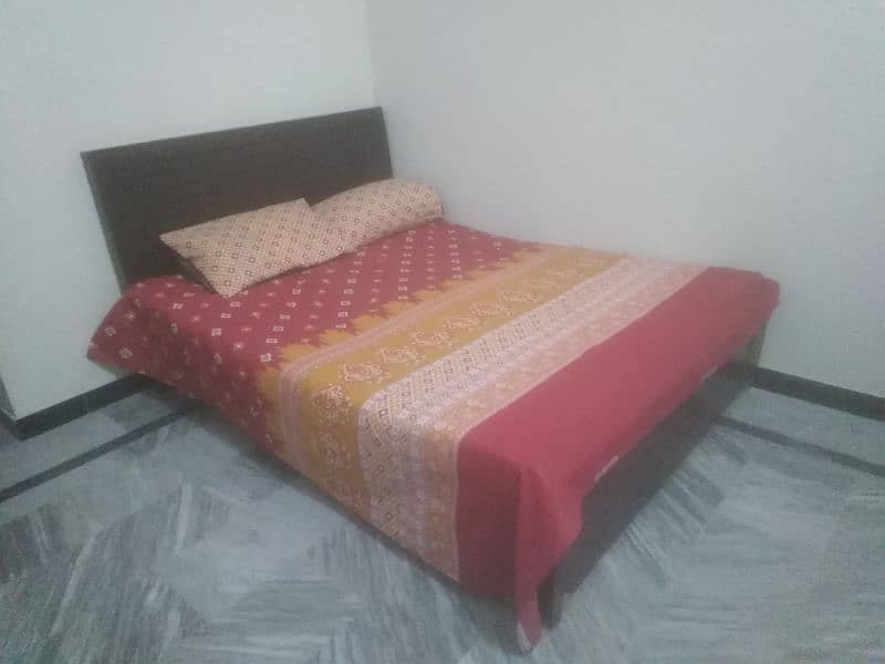 Double bed with foam mattress in good condition 1