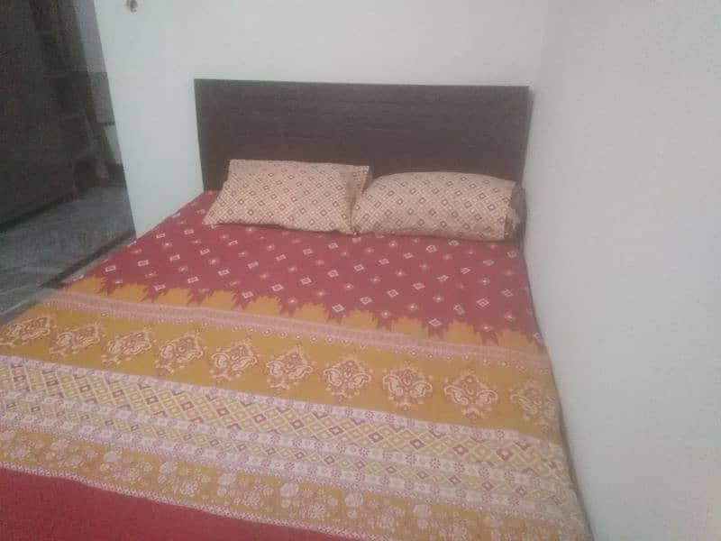 Double bed with foam mattress in good condition 3