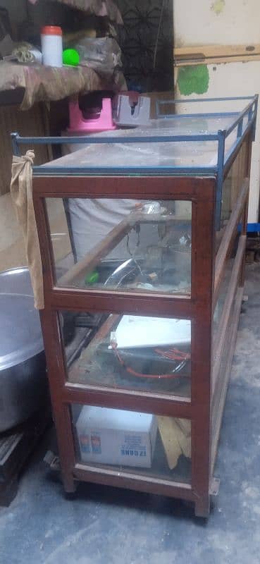 very heavy and iron show case for karyana /mobile/bakery shop