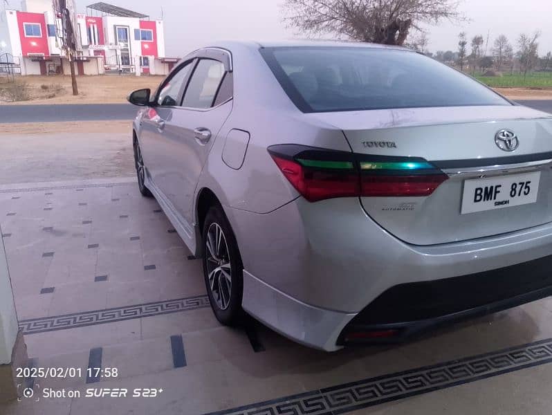 Toyota Corolla Altis 2017 modified into 2021 1 2 piece touchup 4