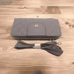 Women's Leather Embroidered Clutches