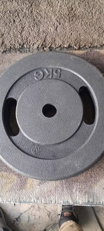 WEIGHT PLATES. GOOD QUALITY. 1 INCH HOLE 4