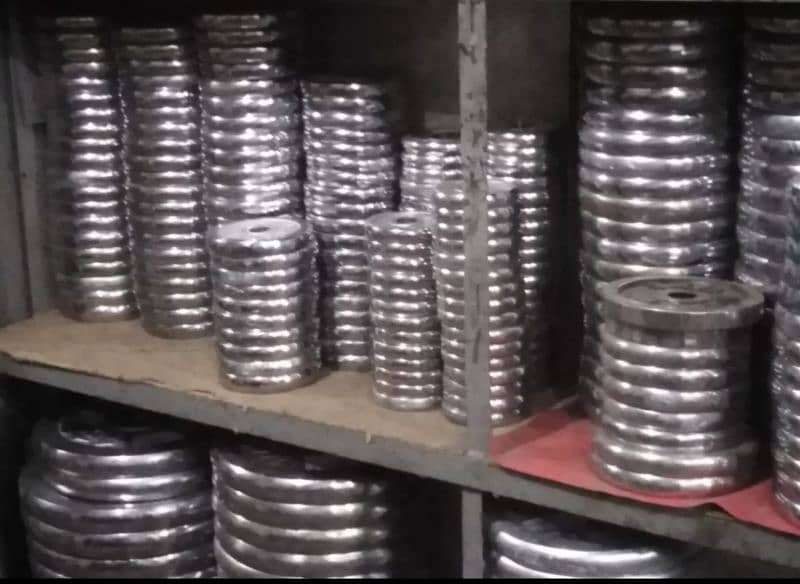 WEIGHT PLATES. GOOD QUALITY. 1 INCH HOLE 8