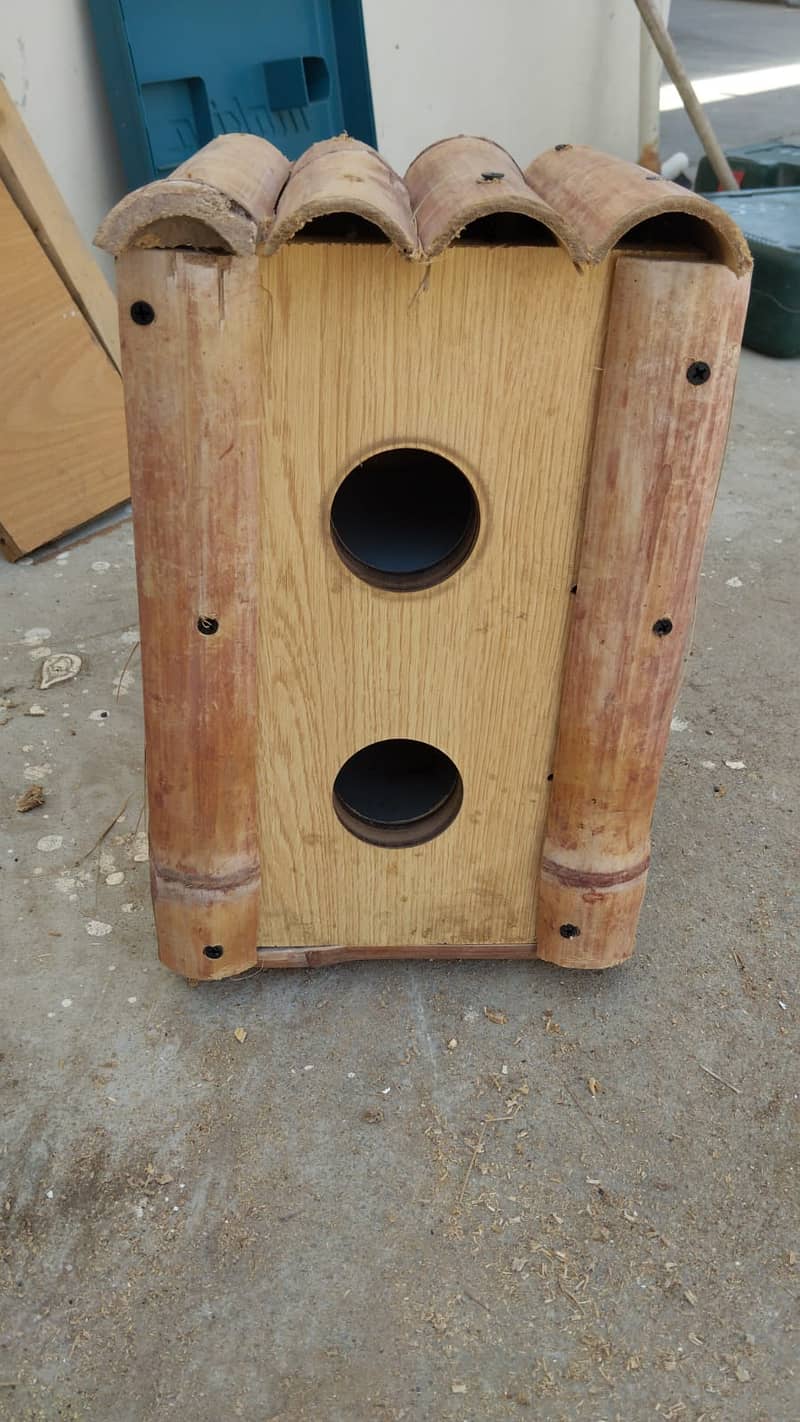Bird house - 2 peigon holes. Very sturdy and solid Bamboo and Lasani. 1
