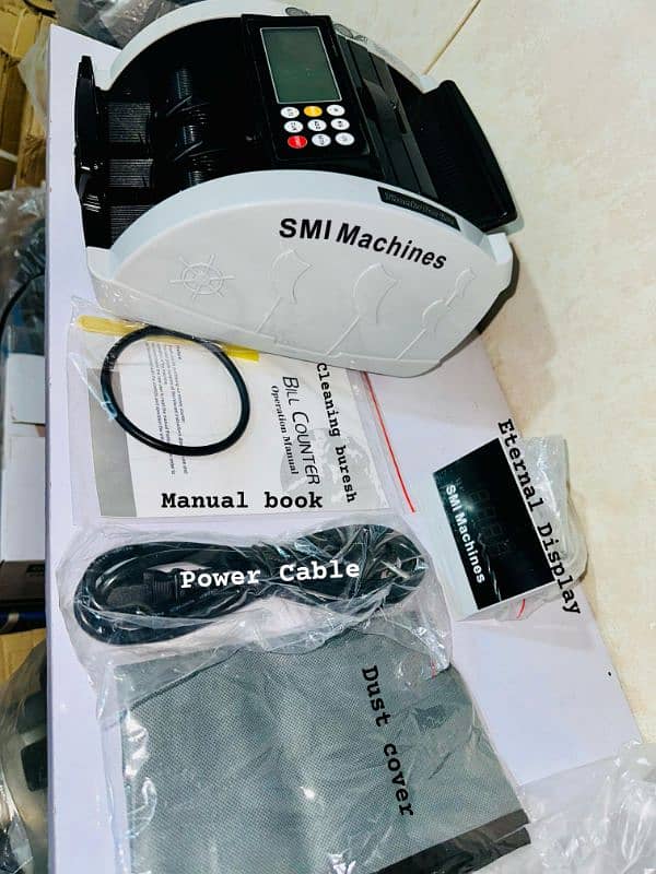 Mix cash note counting machine with fake note detection smi machines. 0