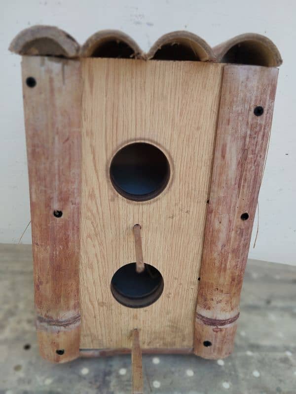 Bird house - 2 peigon holes. Very sturdy and solid Bamboo and Lasani. 4