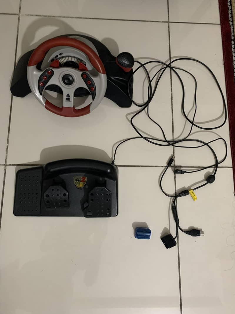 Play station 2 racing wheel and pedals 0