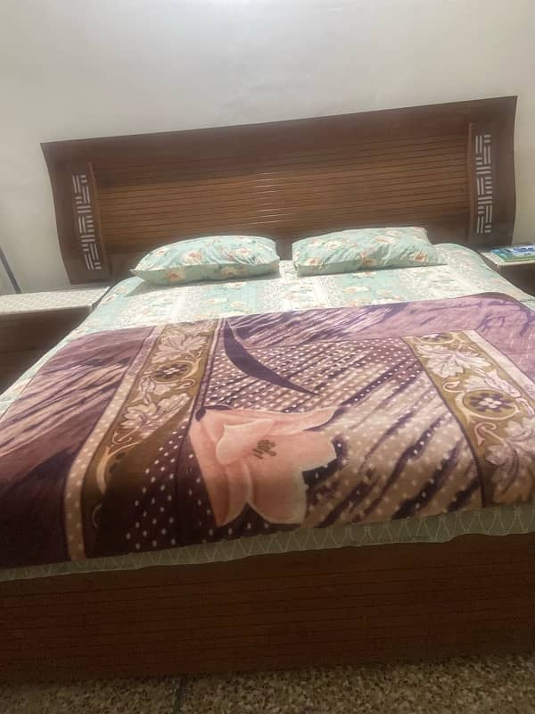 Wooden bed set in good condition 1