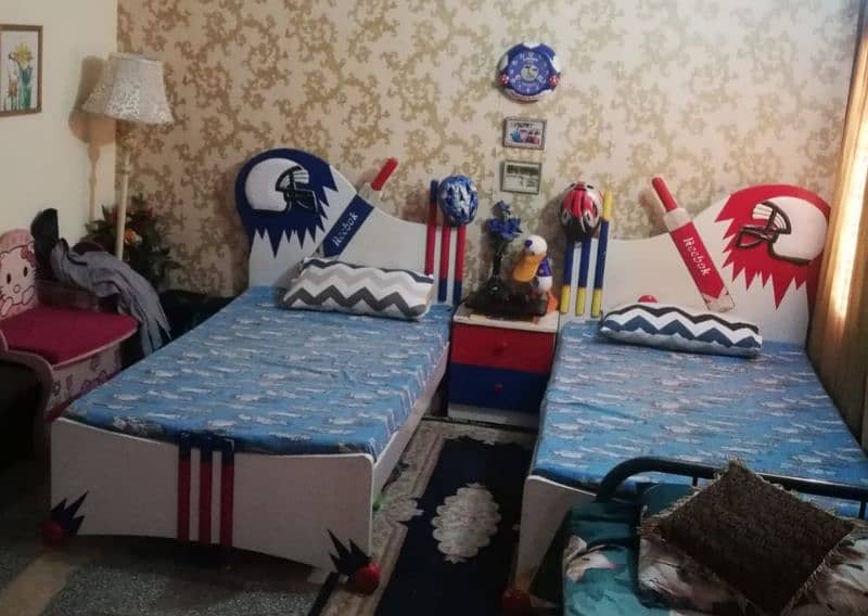 two single beds with side table and mattress 1