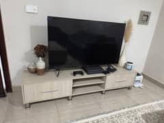 TV Rack almost new and is made with stylish wood