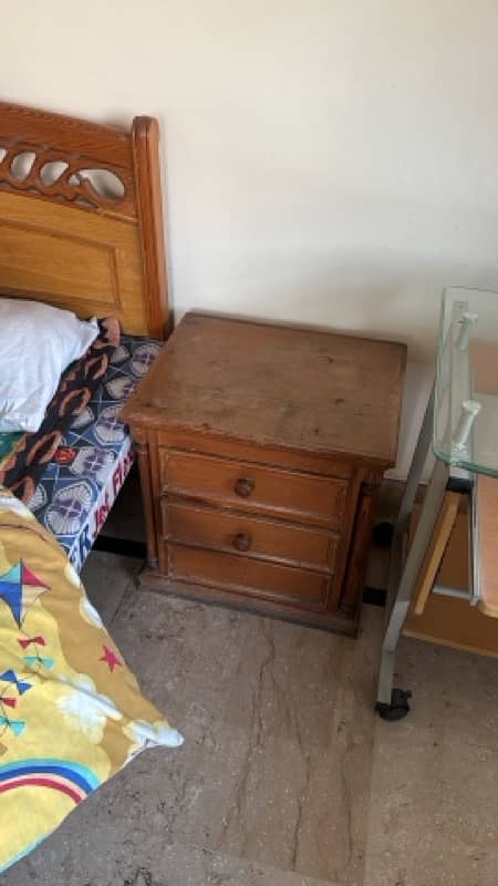 Single wooden beds and sofa set with side table 10