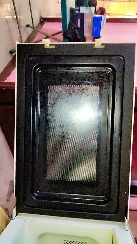 microwave 15 thousand only new condition 1 month used 0