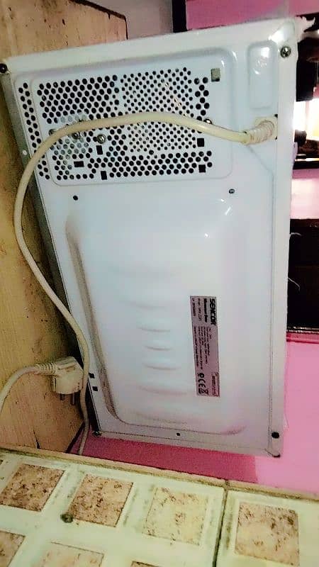 microwave 15 thousand only new condition 1 month used 2