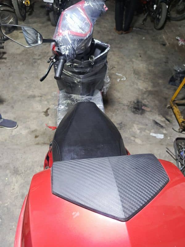 electric three wheeler scooty 9