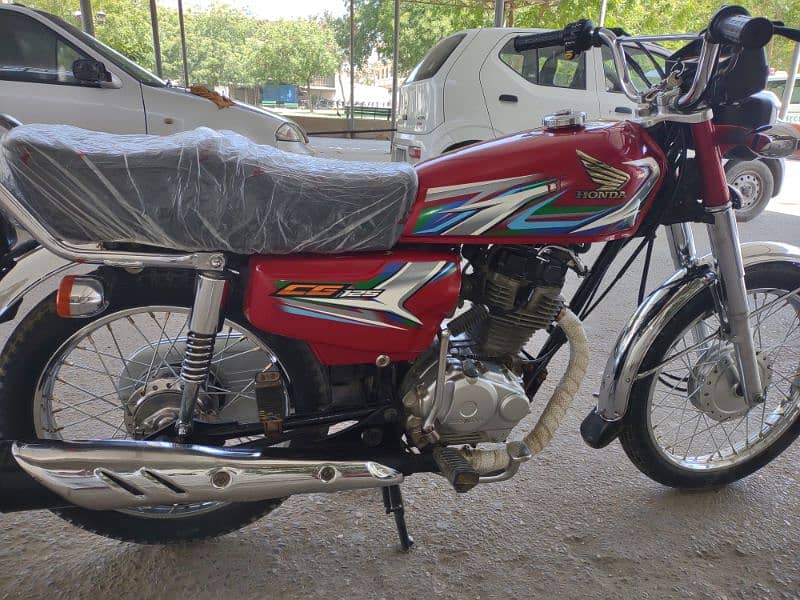 Honda 125 2023 model Karachi numbr 1