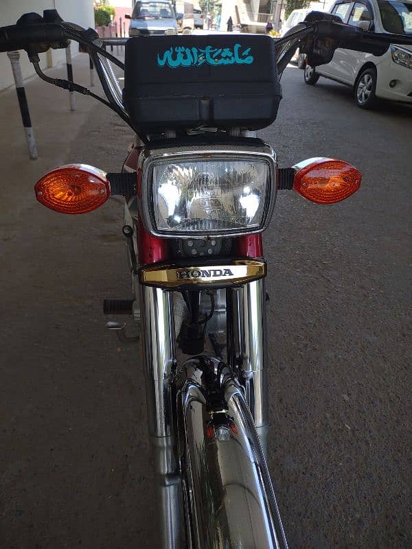 Honda 125 2023 model Karachi numbr 7