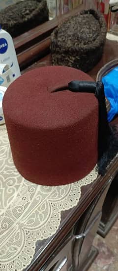 romi cap and Jinnah cap