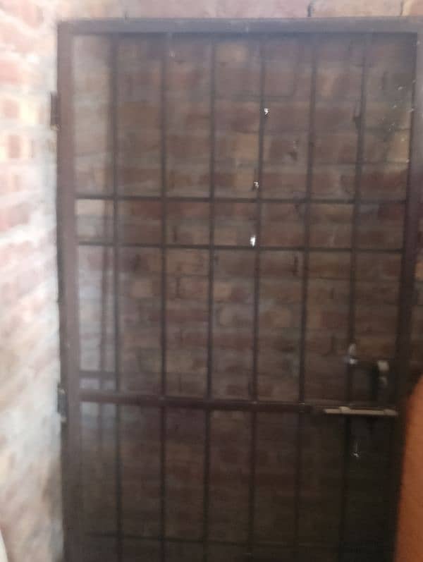 Iron door with grill net 1