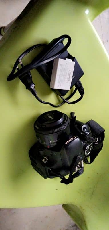 Canon Camera 600D model 7