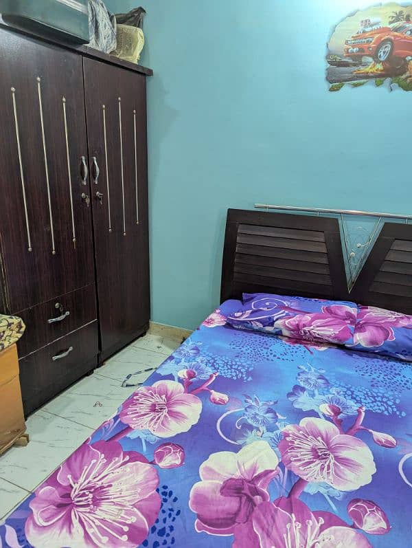 Double Bed with side table and Almirah 0