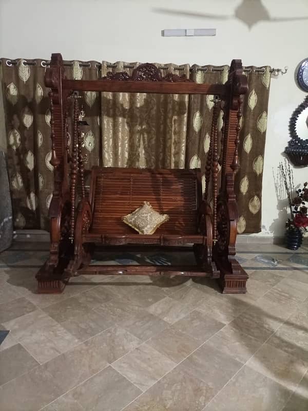Marvel of Craftsmanship and antique eye catching design Swing Seat. 0