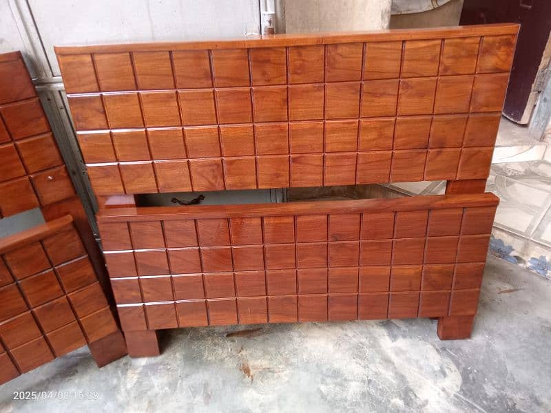 2 wooden single beds 2