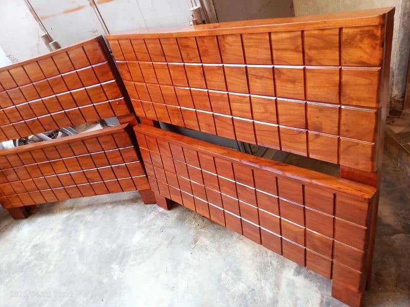 2 wooden single beds 4