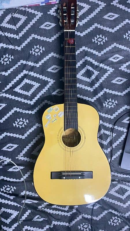Classical style Acoustic guitar and in almost new condition 0