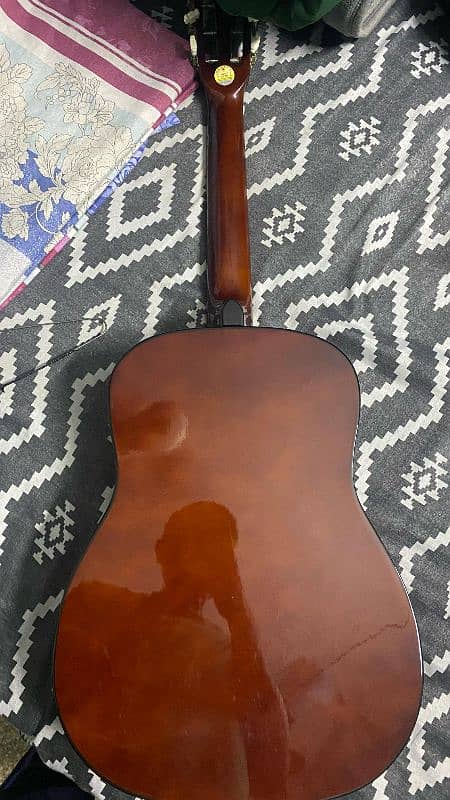 Classical style Acoustic guitar and in almost new condition 1