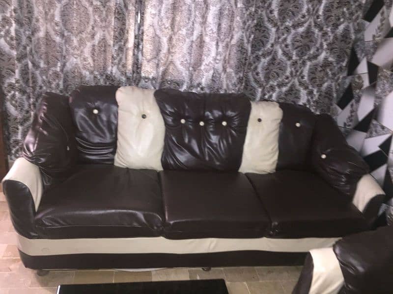 7 seater sofa set and center table 0