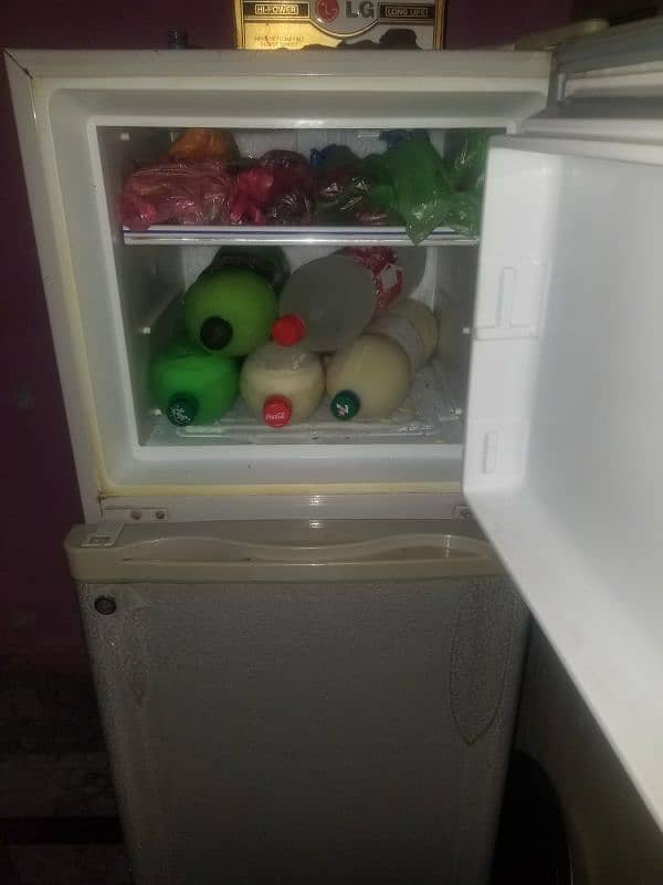 refrigrator dawlance used condition but new jesa ha 7