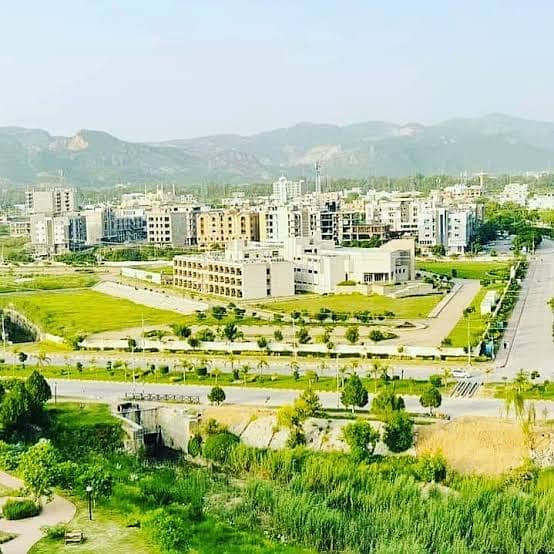 MAIN DOUBLE ROAD 1 KANAL PLOT AVAILABLE IN C BLOCK IN MPCHS MULTI GARDENS B17 ISLAMABAD 9