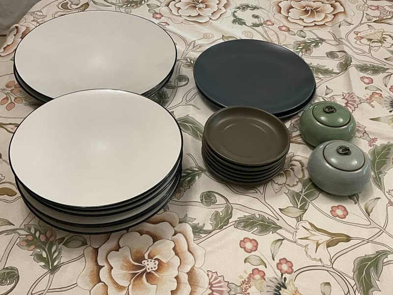 Lightly used dinner plates and serving plates from Denmark. 0