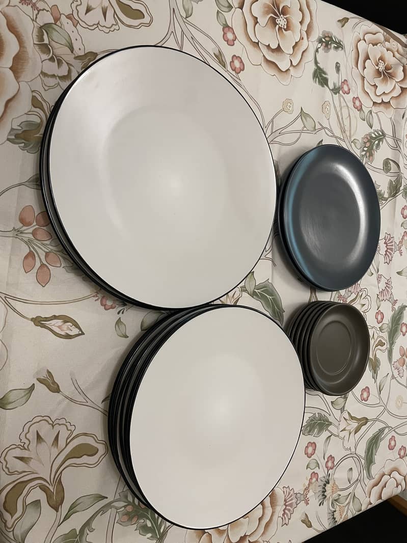 Lightly used dinner plates and serving plates from Denmark. 1