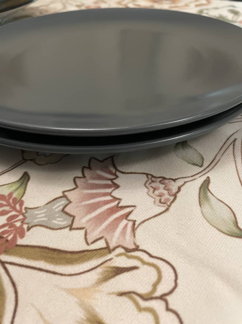 Lightly used dinner plates and serving plates from Denmark. 4