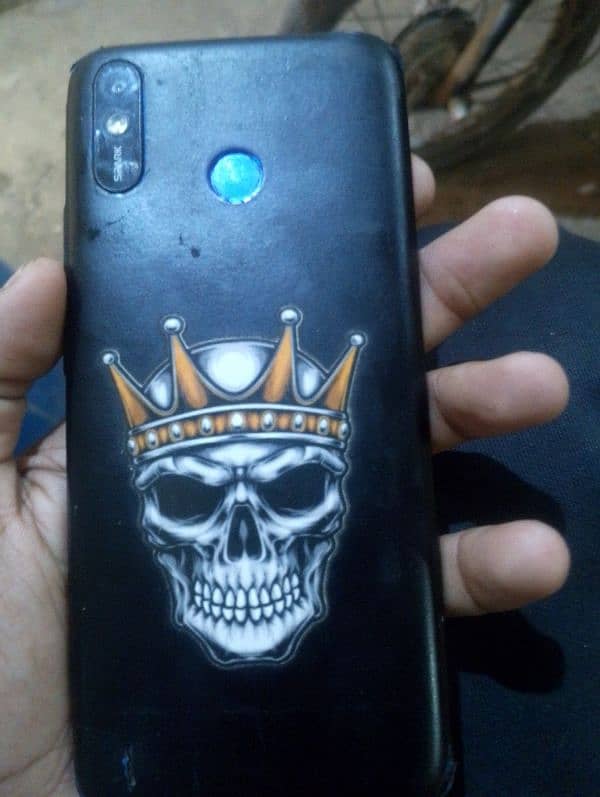 2/32 Tecno spark 4 lite 1
