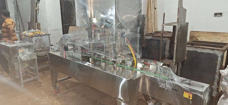 Tetra Pak and Bottle juice Filling Packing Machine in SS Plant 16