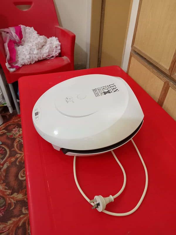 George Foreman Electric Contact Roasting Grill 13