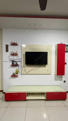 red and white tv console for sale