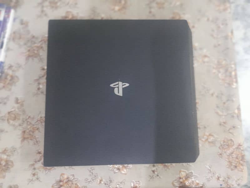 PS4 pro with extra stuff. Price is negotiable. Can deliver to you 1