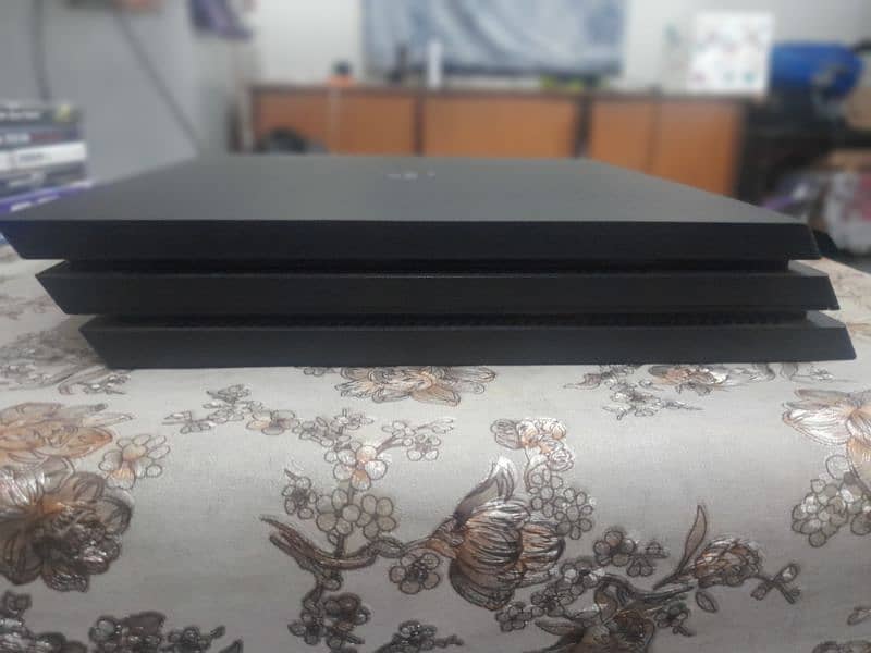 PS4 pro with extra stuff. Price is negotiable. Can deliver to you 2