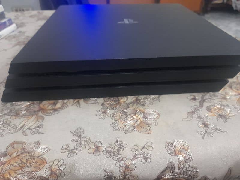 PS4 pro with extra stuff. Price is negotiable. Can deliver to you 4