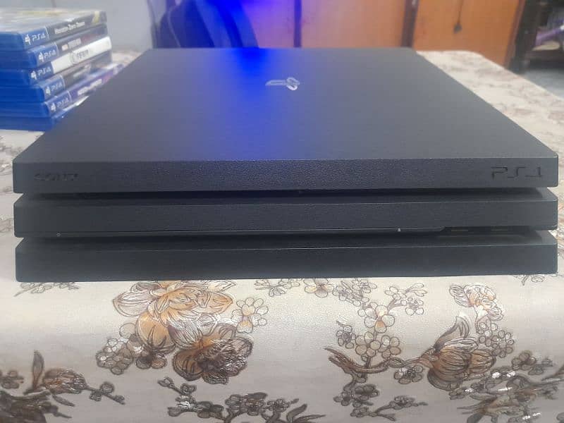PS4 pro with extra stuff. Price is negotiable. Can deliver to you 5