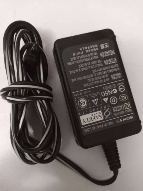 CAMERA BATTERY , CHARGER , ADAPTER 10
