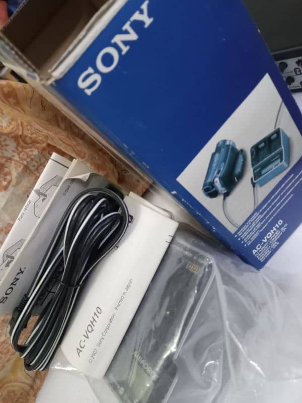CAMERA BATTERY , CHARGER , ADAPTER 11