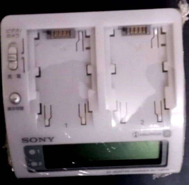 CAMERA BATTERY , CHARGER , ADAPTER 17