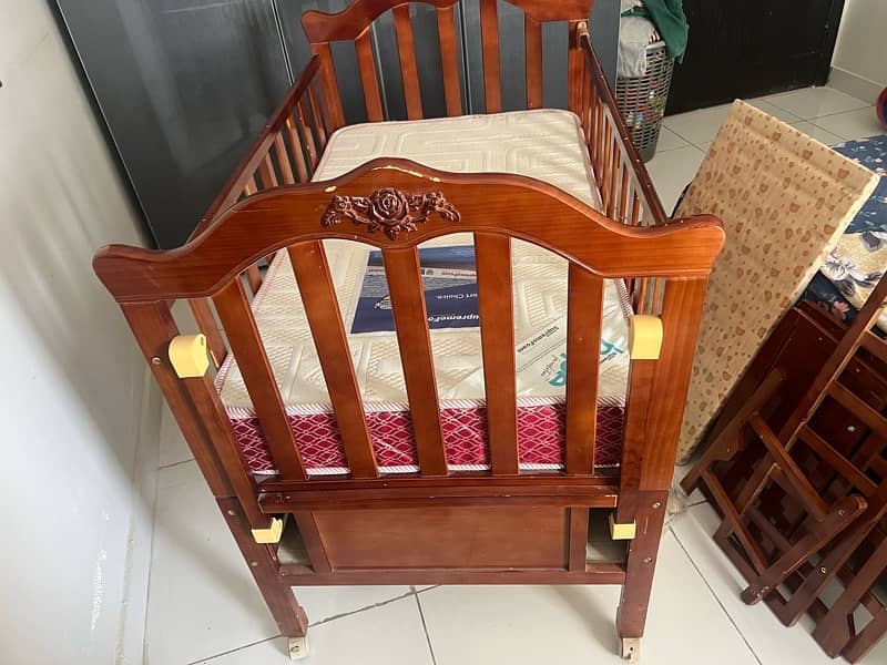 baby cot with swing and matress 9